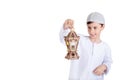 Ramadan Kareem - Happy young kid playing with Ramadan lantern