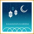 Ramadan Kareem greeting card design in blue and white colours, with crescent moon and arabic lanterns. Royalty Free Stock Photo