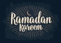 Ramadan kareem lettering with rays, moon and stars