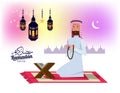 Ramadan Kareem. Muslim man praying and Scene with Mosque or Masjid in Background. Royalty Free Stock Photo