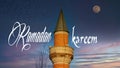 Ramadan Kareem or Ramazan Mubarak . Mahmudiye Mosque at sunset and full moon. Ramadan Kareem text in the image.