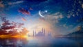 Ramadan Kareem religious background with mosque silhouettes reflected in serene sea Royalty Free Stock Photo