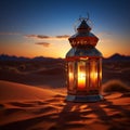 Ramadan Kareem setting Lantern in the desert with sunset backdrop Royalty Free Stock Photo