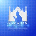 Ramadan kareem with white Mosques silhouettes and muslim man praying vector design