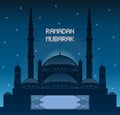 Ramadan mubarak mahya lights over a mosque silhouette