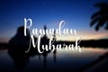 Ramadan Mubarak wording with blur mosque background