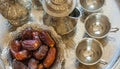Ramadan palm fruit dates in silver bowl and zam zam water Royalty Free Stock Photo