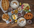 Ramadan Sahur include tomatoes, cucumbers, cheese, butter, eggs, honey, bread, bagels, olives and tea cups. Royalty Free Stock Photo