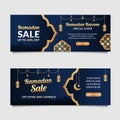 Ramadan sale web header or banner design with golden shiny frame, Arabic lanterns, stars, moon and Islamic ornament on blue backgr Royalty Free Stock Photo