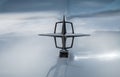 Vintage Lincoln Continental hood ornament on white background