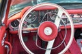 Vintage Luxury Mercedes Cabriolet interior - steering wheel with logo and dashboard