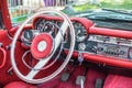 Vintage Luxury Mercedes Cabriolet interior - steering wheel with logo and dashboard