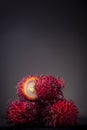 Rambutan berries with white pulp showing Royalty Free Stock Photo