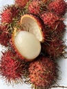 Rambutan fruits on a white background