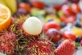 Rambutan peeled and colorful fruit background - Fresh rambutan summer fruit from garden in Thailand