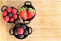 Ramekins of healthy ripe fresh mixed berries Royalty Free Stock Photo