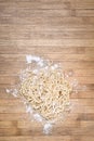 Ramen, chinese vermicelli on wooden background