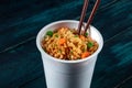 Ramen cup. Instant noodles with chopsticks Royalty Free Stock Photo