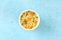 Ramen cup, instant noodles in a plastic cup, overhead shot Royalty Free Stock Photo