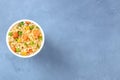 Ramen cup, instant soba noodles with vegetables in a plastic cup, top-down shot Royalty Free Stock Photo