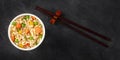 Ramen cup panorama, instant noodles in a plastic cup, overhead flat lay shot with chopsticks Royalty Free Stock Photo