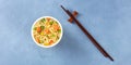 Ramen cup panorama, instant soba noodles in a plastic cup, shot from above Royalty Free Stock Photo