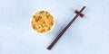 Ramen cup panoramic overhead shot, instant soba noodles in a plastic cup Royalty Free Stock Photo