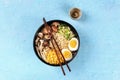 Ramen. Soba noodles with boiled eggs, shiitake mushrooms, and vegetables, shot from above Royalty Free Stock Photo