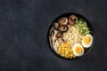 Ramen. Soba noodles with eggs, shiitake and enoki mushrooms, and vegetables Royalty Free Stock Photo