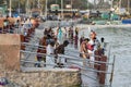 Pilgrims Hindu people bathing in the Arabian Sea before entering the temple