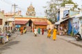 In the main street, Unidentified Hindu pilgrims people ready to go to the temple by walking, after the bath at the gate. Great tim