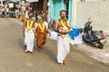 In the main street, Unidentified Hindu pilgrims people ready to go to the temple by walking, after the bath at the gate. Great tim