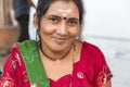 Portrait of Asian senior beautiful woman smiling wearing traditional Indian dress sari. Royalty Free Stock Photo