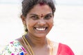 Portrait of Asian senior beautiful woman smiling wearing traditional Indian dress sari. Royalty Free Stock Photo