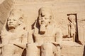 Ramesses the second or Ramesses the Great and Horus statues carved in rock at Abu Simbel Temple Royalty Free Stock Photo