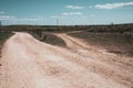 A ramification Country dirt road diverges in two directions. Choices uncertainty Royalty Free Stock Photo