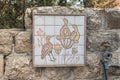 Decorative drawing depicting birds and flowers on a stone wall in the territory of Emmaus Nicopolis