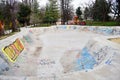 Ramnicu Valcea, Romania - 02.04.2019 - skating skate park skatepark design skateboard skateboarding empty concrete with graffiti