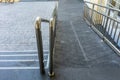 Ramp for handicap or wheelchair with stainless steel bar