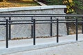 Ramp for wheelchair entry with metal handrails