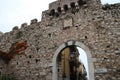 rampart and gate (porta catania) in taormina in sicily (italy) Royalty Free Stock Photo