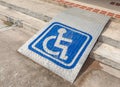 Ramped access, using wheelchair ramp with information sign on fl Royalty Free Stock Photo