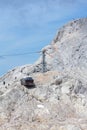 People hiking on Gjaidstein Mountain adventure trail near Dachstein glacier on August 17, 2017 in Ramsau am Dachstein, Austria.