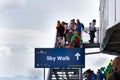 Tourists walk on Dachstein Sky Walk Royalty Free Stock Photo