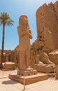 Ramses's II statue with wife Nefertari in the Karnaksky temple Royalty Free Stock Photo
