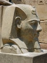 Stone head of an Egyptian pharaoh in Luxor, Egypt