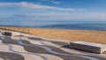 Ramsgate beach main sands and wave patterned concrete promenade  on a clear blue winter day Royalty Free Stock Photo