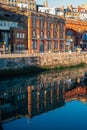 The historic home for smack boys building in Ramsgate Royal Harbour reflecting in the water