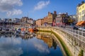 The bright colourful buildings, cafes and restaurants along the quayside of the impressive historic Royal Harbour, Ramsgate