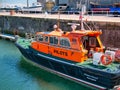 The Ramsgate Royal Harbour pilot services boat Estuary Escort, featuring bright orange superstructure